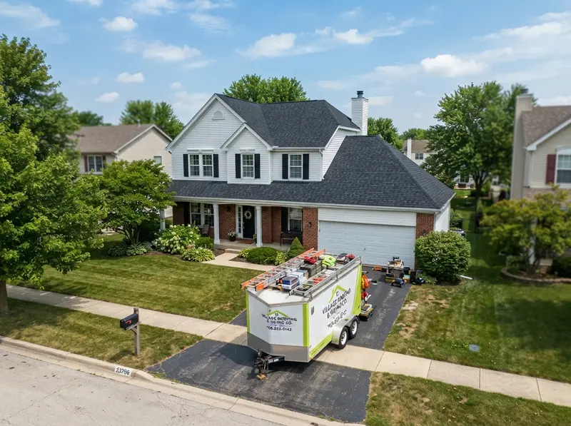 New shingle roof installation on suburban home New shingle roof installation on suburban home